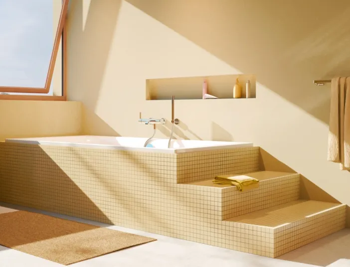 Badewanne mit Armatur IMO von Dornbracht in elfenbeinfarbenen Badezimmer